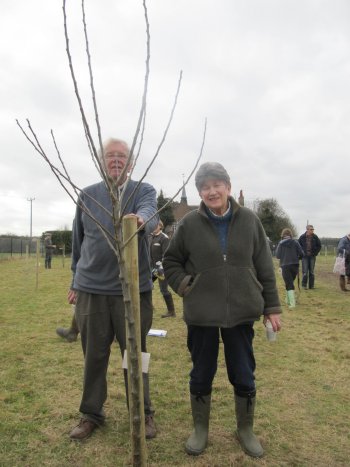 Roger and Celia Worraker with a splendid Bramley Tree